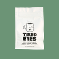 A bag of specialty coffee, roasted by Tired Eyes Coffee in San Diego, CA.